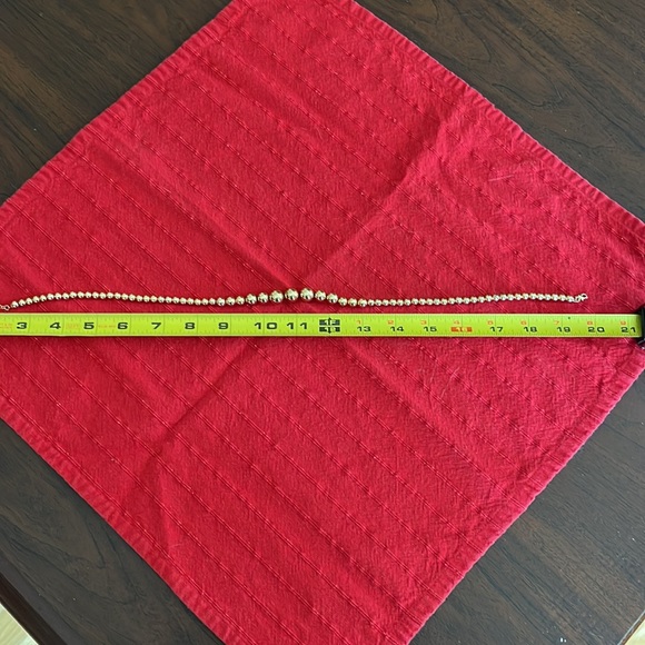 Gold tone Graduated Ball necklace. 16” - 18” long. In very good condition. - Picture 2 of 4